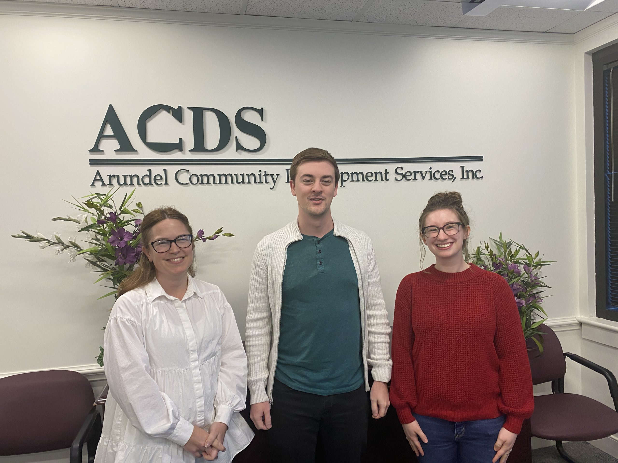 photo of three people